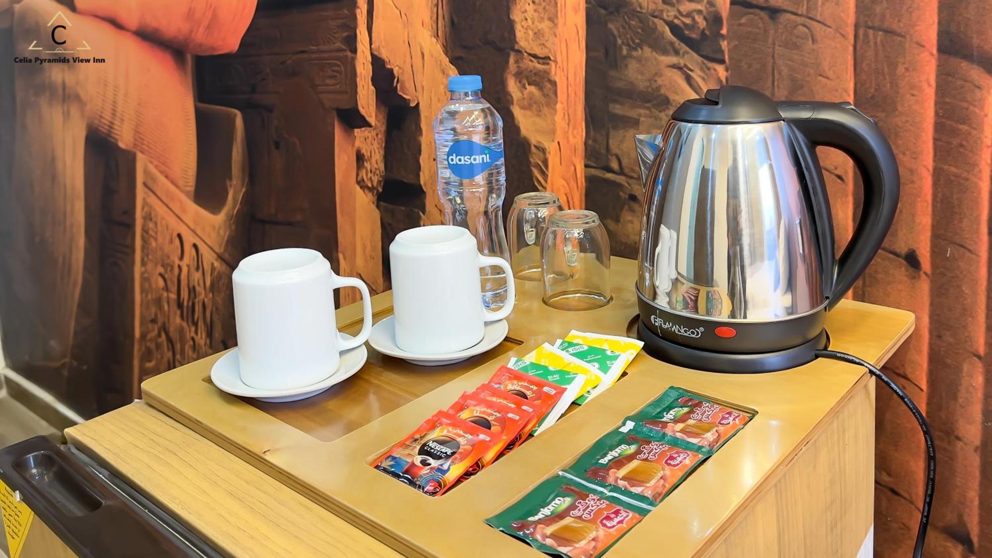 Celia Pyramids View Inn Nazlet el-Sîsi エクステリア 写真