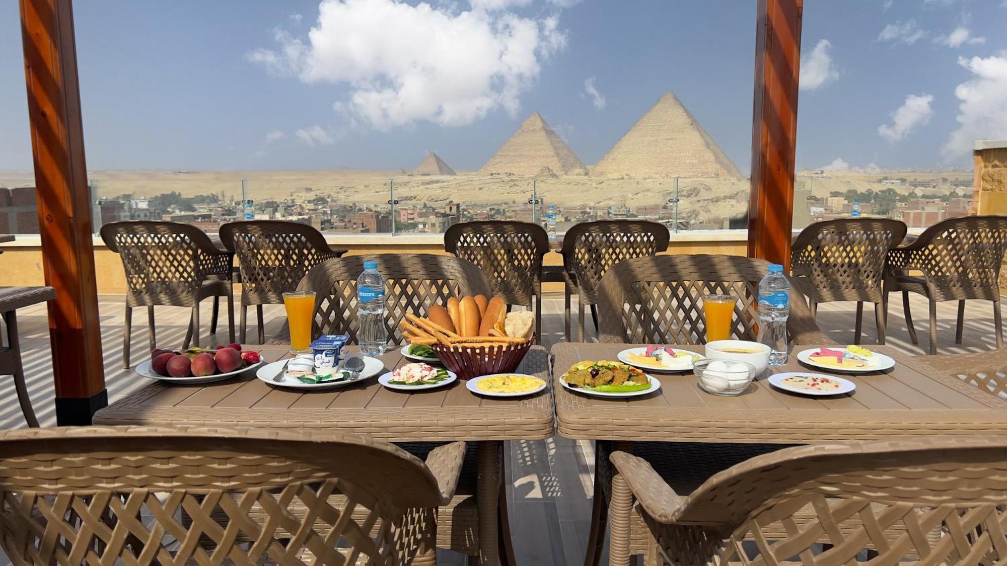 Celia Pyramids View Inn Nazlet el-Sîsi エクステリア 写真